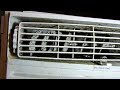 Cleaning mold out of a window AC unit.