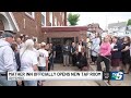 The Mather Tap Room opens to the public following a ribbon cutting