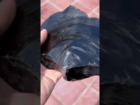 Video: Volcanic glass. Volcanic obsidian glass. A photo