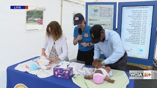 Champaign, Rantoul Mayors compete in diaper race