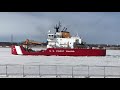 U.S. and Canadian Coast Guard boats up bound out of the Soo Locks