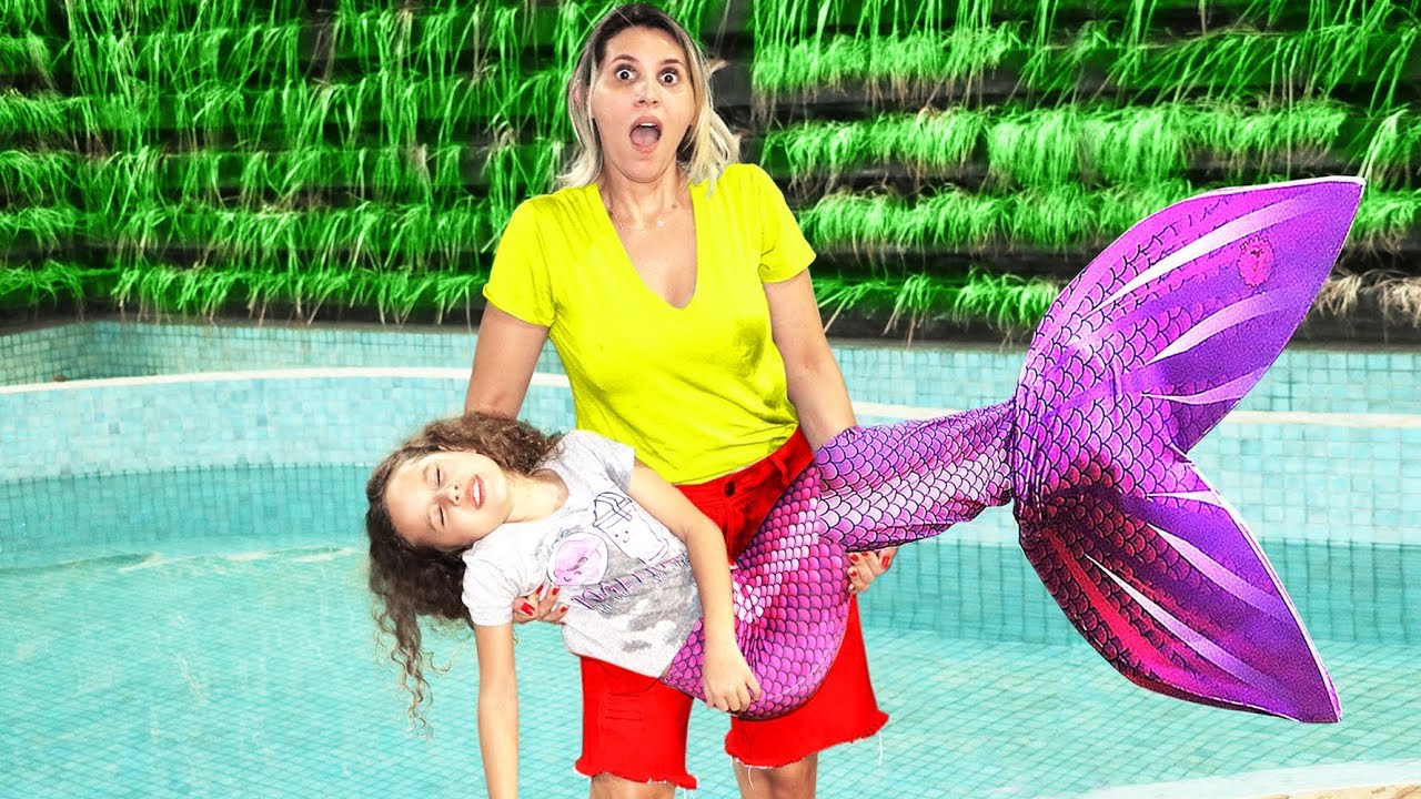 ERLANIA SALVA VALENTINA PONTES A MENINA SEREIA AQUÁTICA