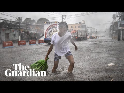 Typhoon Kammuri slams into Philippines forcing hundreds of thousands to flee