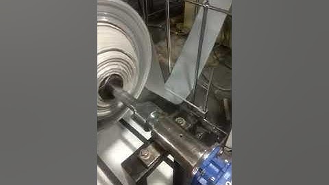 Induction wad punching machine