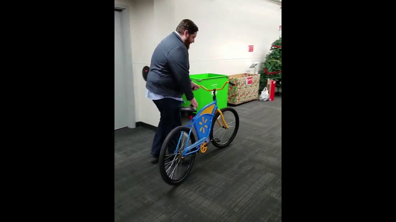 Mike Carey rides backwards bike