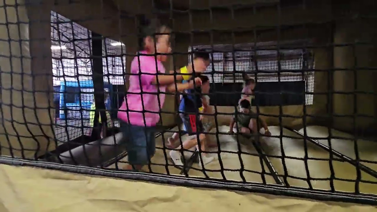 Juni jumping in the bounce house at the Clark County fair.