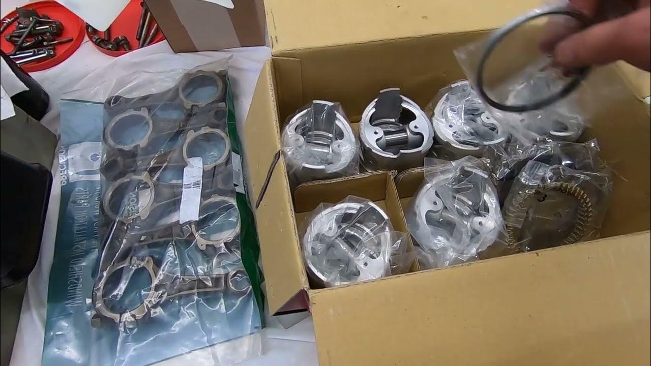 Installing Pistons on the Connecting Rods and Putting the Rings on the