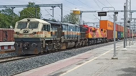 Double stake Container train stops @ station for overtake superfast train. #railfununlimited #wdg4