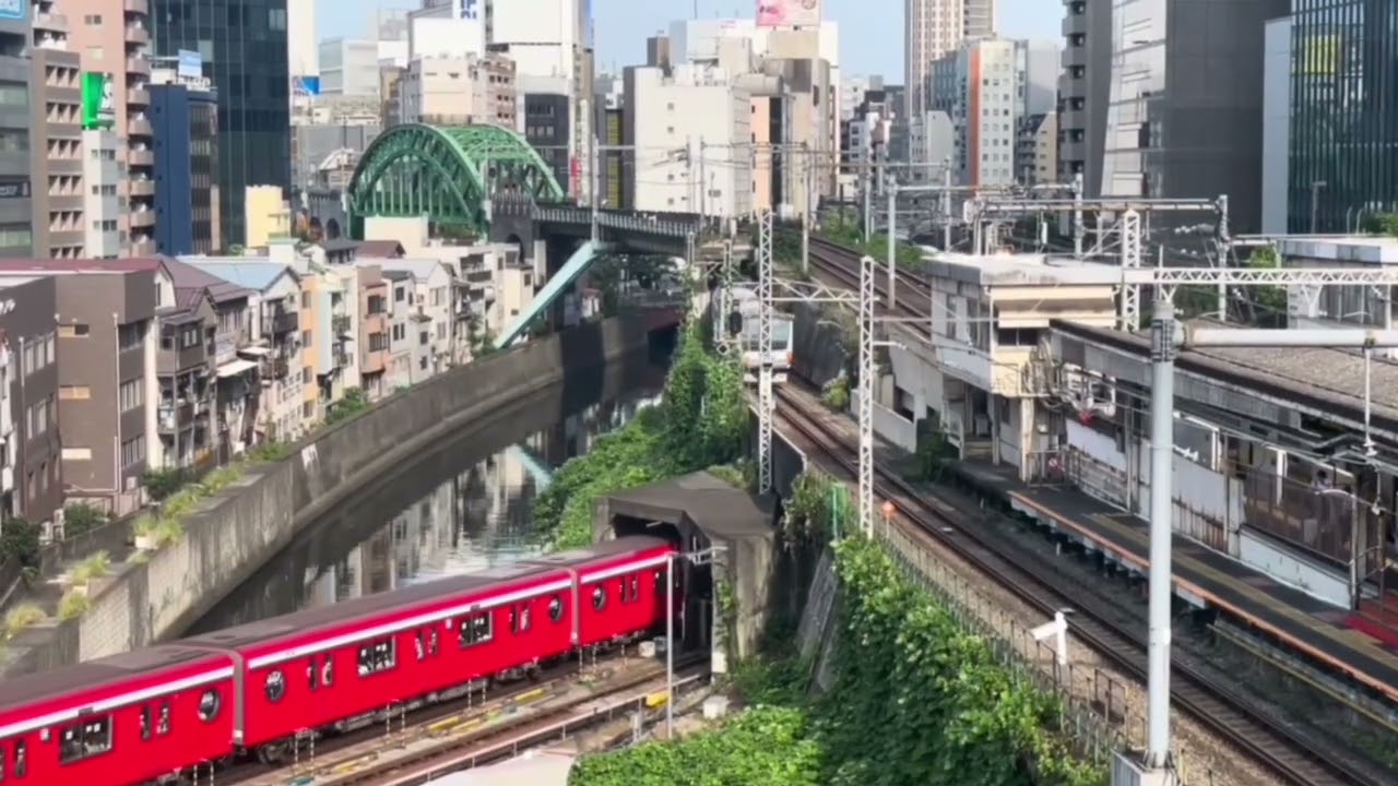 Hijiri Bridge at Ochanomizu Station, trains crossing Kanda River, Tokyo Japan ambiance 