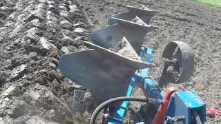 New Holland Boomer 50 Plowing