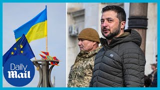 Zelensky emotional as Ukraine flag is raised in Kherson