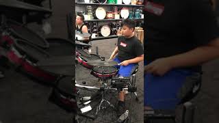 Testing out drum sets at Guitar Center screenshot 1