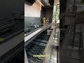 Minimalist stainless steel countertop interprets high-end kitchen aesthetics.#LowMaintenanceKitchen