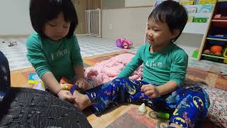 twins cute bonding | helping to get socks on by Twins Filipina Mom in South Korea 66 views 3 months ago 1 minute