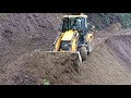 New JCB EcoeXcellence Backhoe-Excellent Work-Leveling a Bend