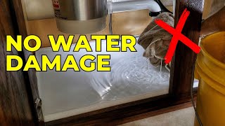 What is the best way to clean water under the sink?