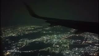 Naik pesawat malam hari