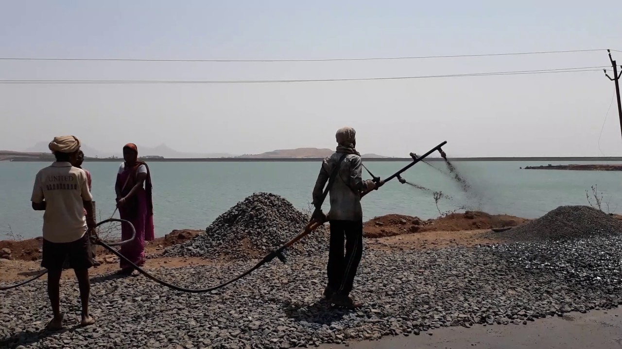 Bitumen Spraying Layer-1 over Built Up Spray Grout (BUSG) - YouTube