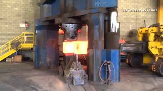 17,500 LB titanium ingot at 2,000 degrees is pressed at Weber Metals in Paramount