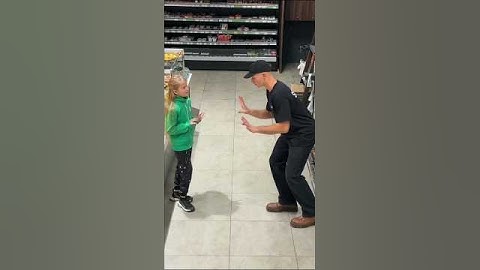 Security guard makes little girl happy