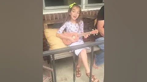 Savi singing with ukulele