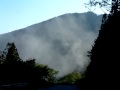 陽光把山谷內的山嵐照的沸騰,旋轉著往天空飛去