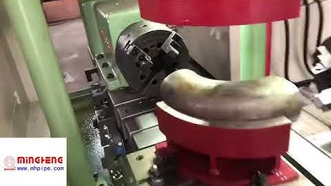 Elbow beveling machine; end facing and chamfering pipe fittings machinery