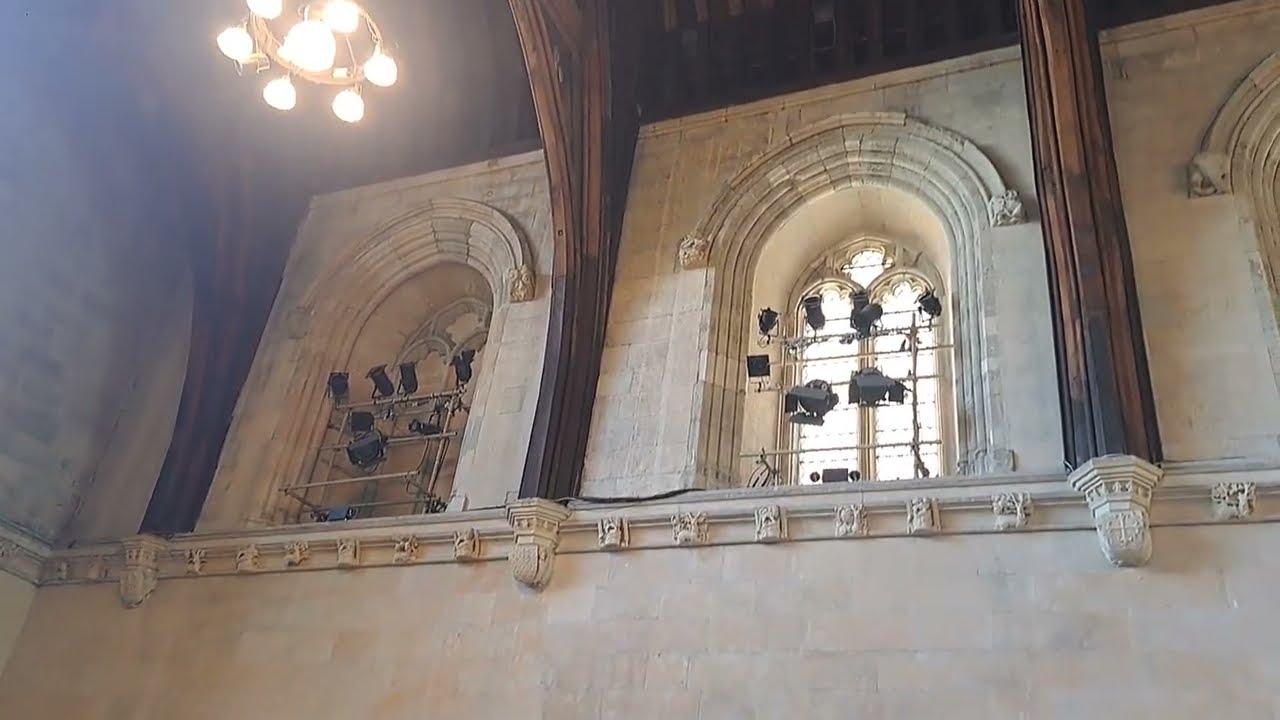 Westminster Hall magnificent Medieval hammerbeam roof with carved angels holding royal shields.