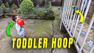 Skilled Toddler Landing Ball In A Hoop Twice