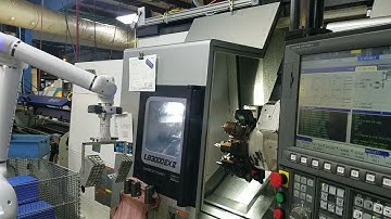 Auto Door opener on Okuma lathe