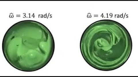 Displacement flows in rotating pipes