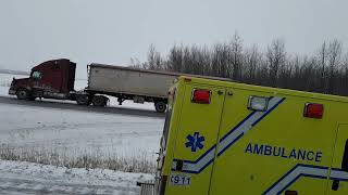 Winter in Quebec. Canada. Truck and cars  out of control.