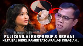 Hj Faisal's anger peaks after Fuji shows off a tattoo on his back, dragging in the name of the ma...