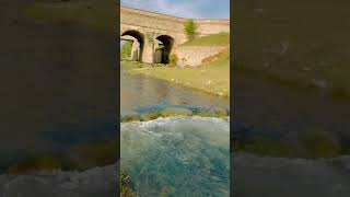 Nature's Harmony: Ancient Bridge and Flowing Waters #nature #travel #explore #adventure #shorts