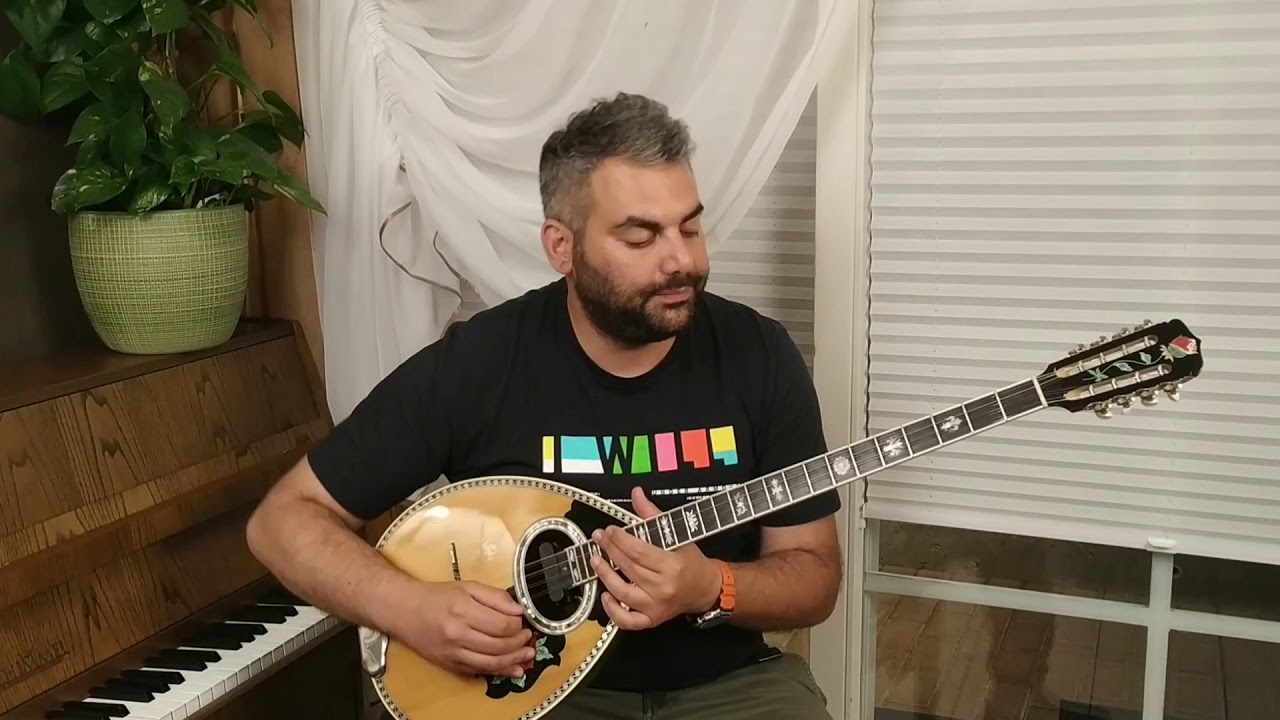 Και χίλια περιστέρια.μαθημα για μπουζούκι