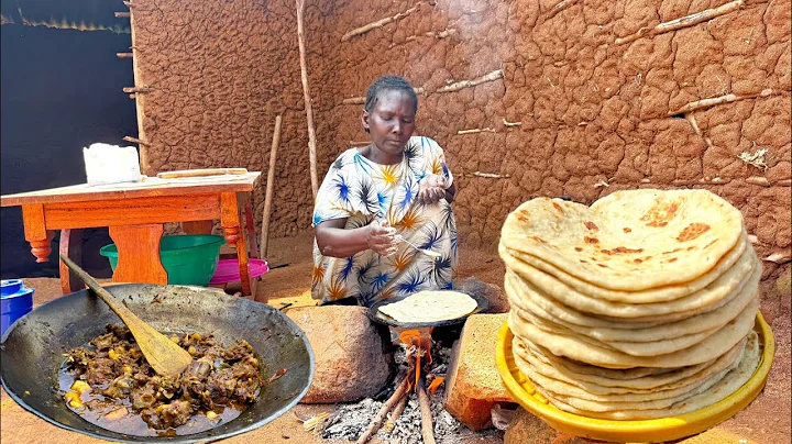 Juicy Jamaican Oxtail Over Open Fire 🔥 Served with Soft Layered Chapati |Traditional Village Cooking