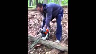 Jonathan uses chain saw for 1st time.