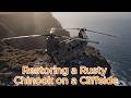 dream space revive restoring a rusty chinook on a cliffside