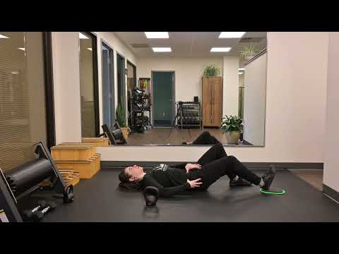 Hooklying KB Pullover with Leg EXT with Hip IR Bias