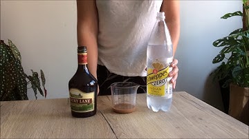 Neerslagreacties - Baileys + tonic