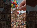 Watch what happens when the balloons pop