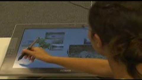 Interacting with Large Displays using Tabletop Devices