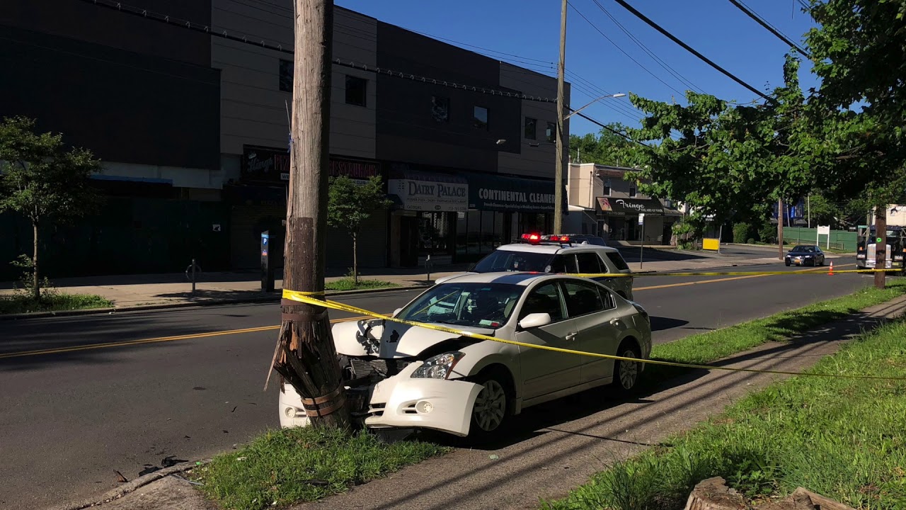 Wires spark after a car hits utility pole - YouTube
