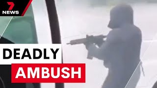 Terrifying moment masked gunmen ambush prison convoy in France | 7 News Australia