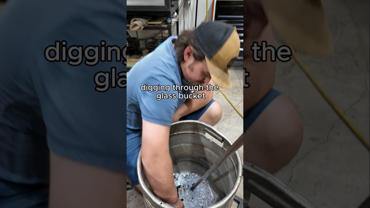 digging in the glass bucket to recycle #glassblowing #recycled #smallbusiness