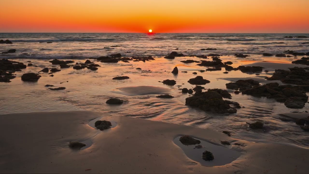 Orange Sunset over a Rocky Beach with Calming Ocean Waves | Relaxing ASMR for Deep Sleep | 3H in 4K