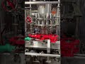 Pfaudler 14-Valve Rotary Piston Filler offered by Litchfield Packaging Machinery Corporation