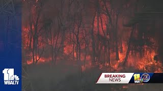 Fire crews still working to extinguish 8-alarm brush fire in Owings Mills area