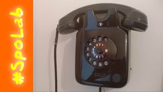 Vecchio telefono a parete nero Telenorma