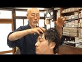 Experience a fantastic massage at a Japanese barbershop that's been in business for over 100 years